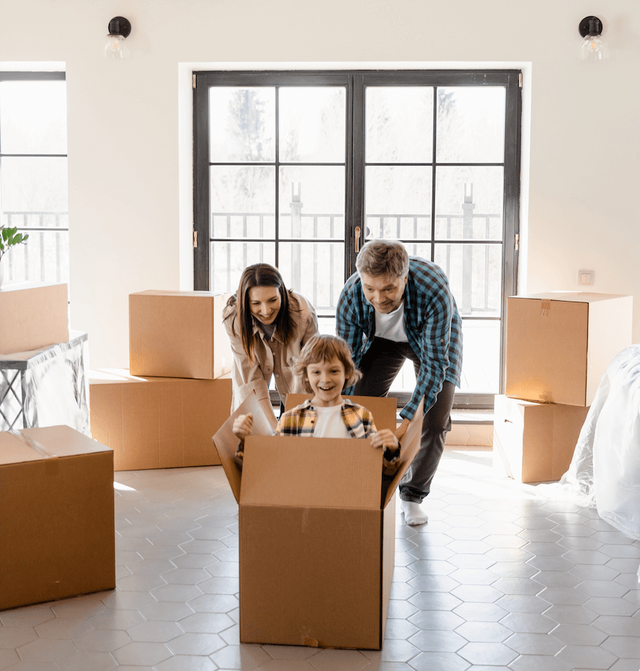 Happy family moving into new home in Luxembourg